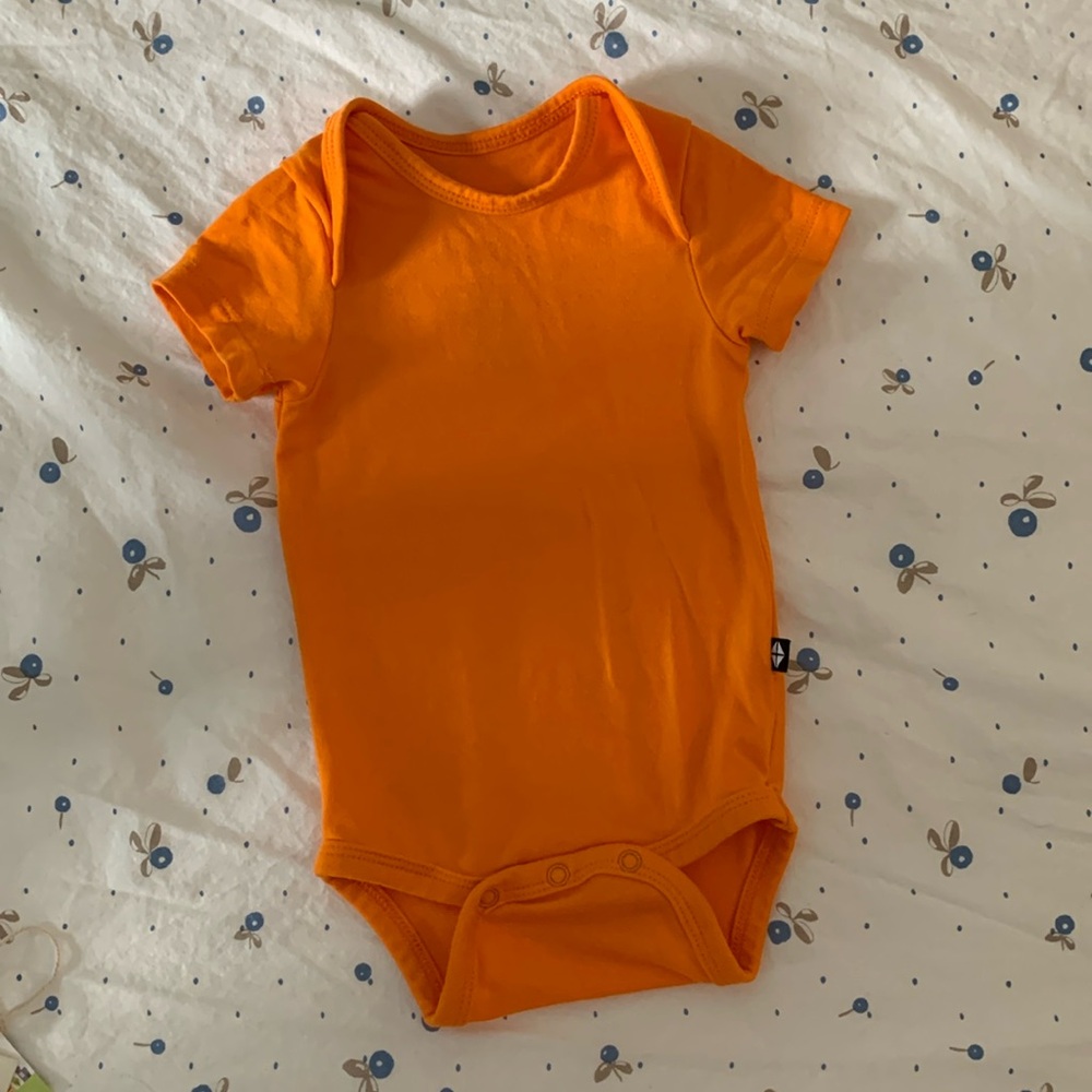 Kyte Baby Newborn onesie Orange